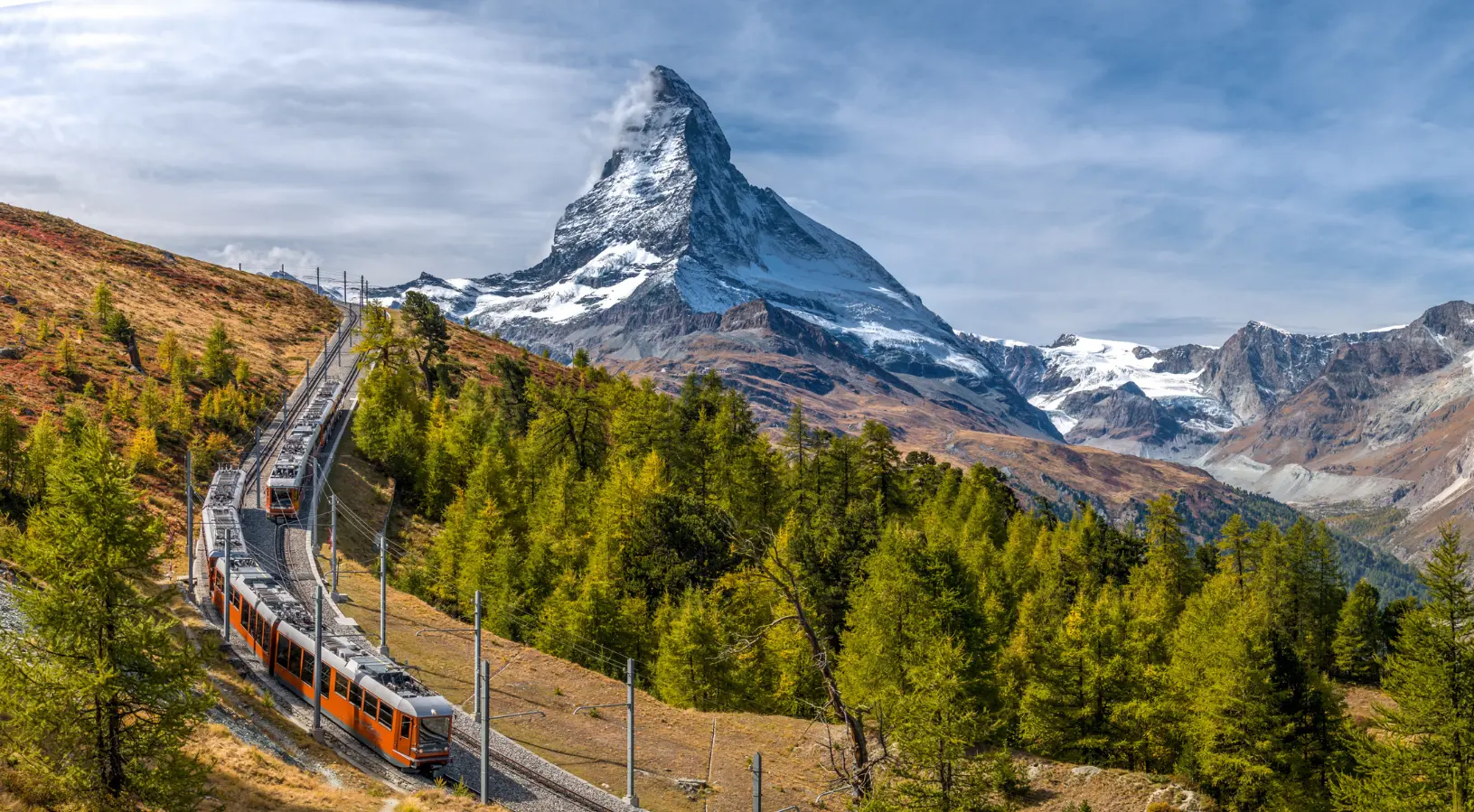 Romantic alpine spa experience with panoramic Matterhorn views, perfect for a luxury Switzerland Tour Package for couple seeking privacy and relaxation.
