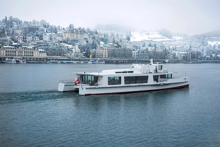 A boat cruising the pristine waters of Lake Lucerne in Switzerland