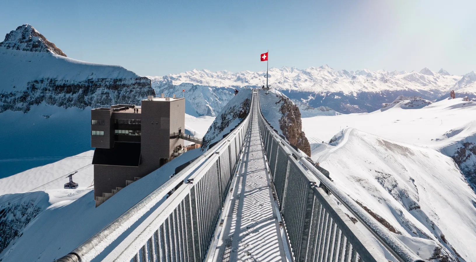 The Peak Walk by Tissot suspension bridge at Glacier 3000, the world's first peak-to-peak bridge, linking two summits at 2,971 metres above Les Diablerets, Switzerland