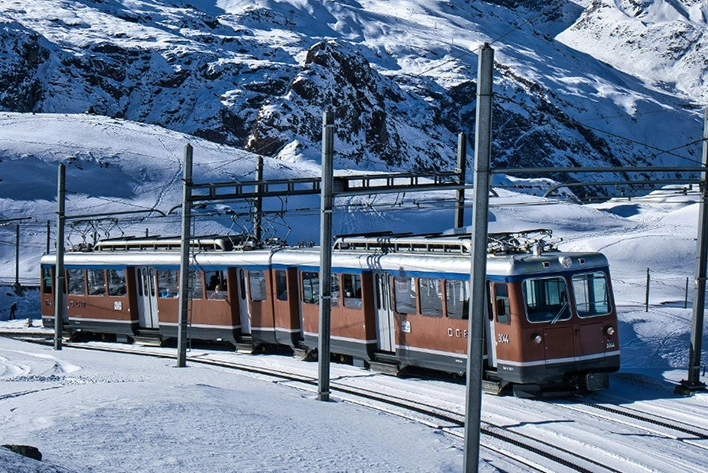 Stunning view from Gornergrat in Zermatt, Switzerland, featuring the iconic Matterhorn mountain surrounded by a breathtaking panorama of snow-covered peaks